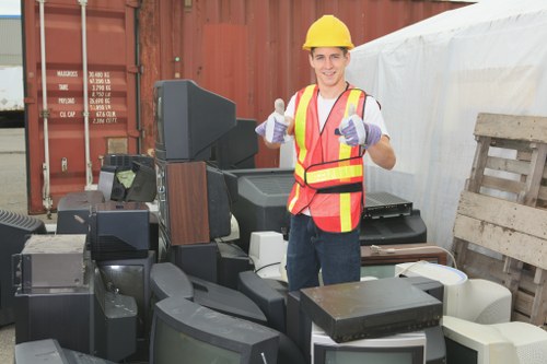 Front view of commercial waste bins on a street